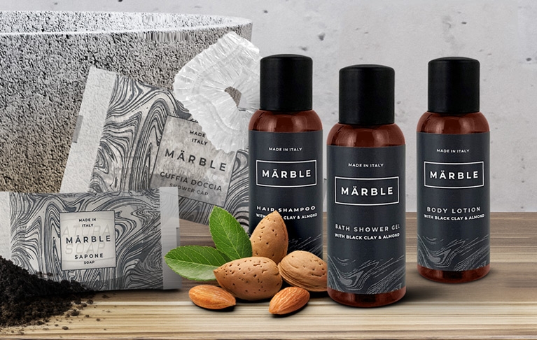 Linea cortesia design moderno. Cosmetici con argilla nera e mandorla.